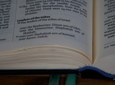 a close up of an open book on a table
