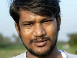 a close up of a man with a beard