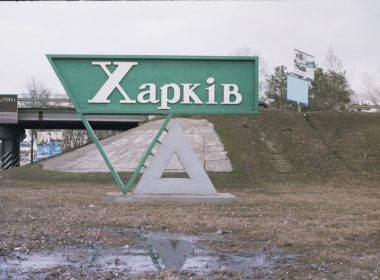a green sign that says kapkib on it