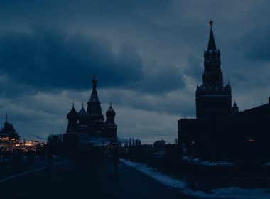 a dark picture of a city at night