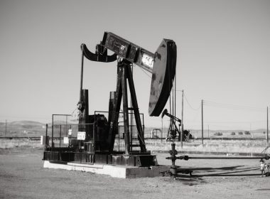 a black and white photo of an oil pump